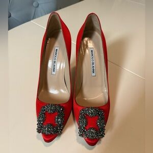 Manolo Blahnik Hangisi Red Satin Jewel Buckle Pumps.